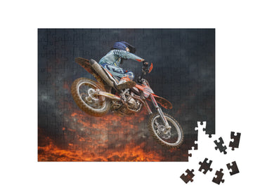 Jumping Motocross Rider with Firestorm in the Background