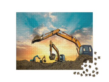 Four Excavators Work on Construction Site At Sunset